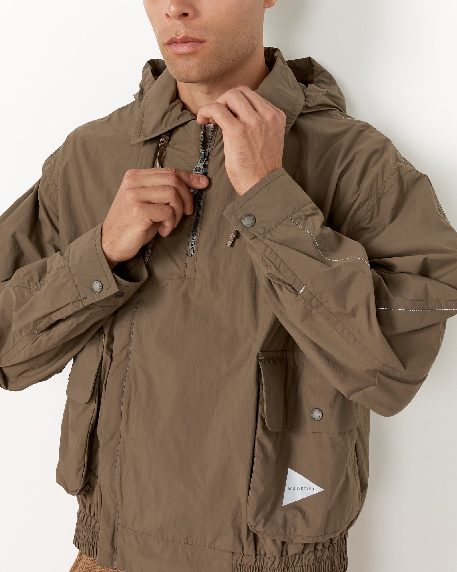 And Wander 40 Water Repellent Light Jacket - Khaki / M (254288)