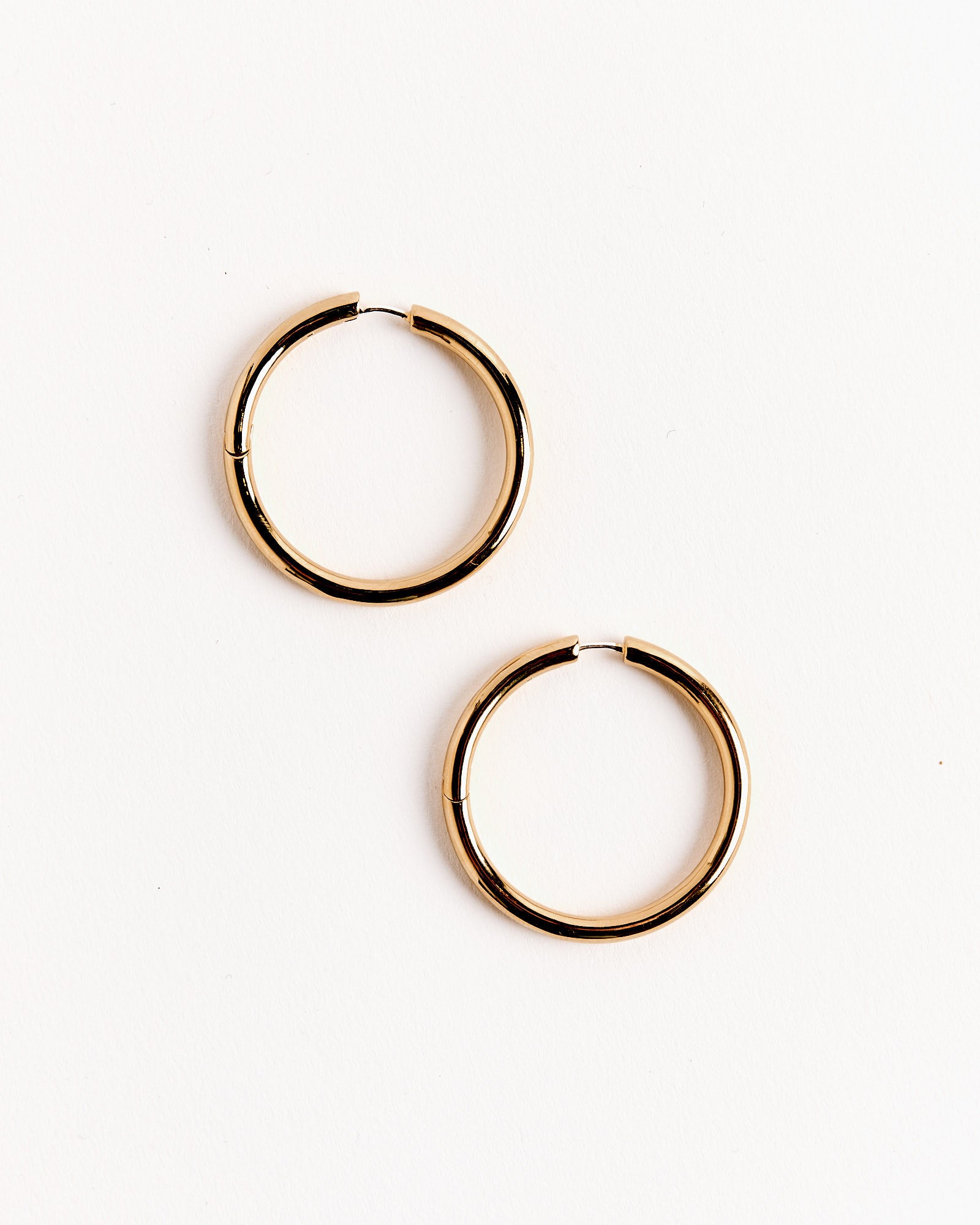 Large Seamless Hoops in Gold Tone - Default Title (264031)